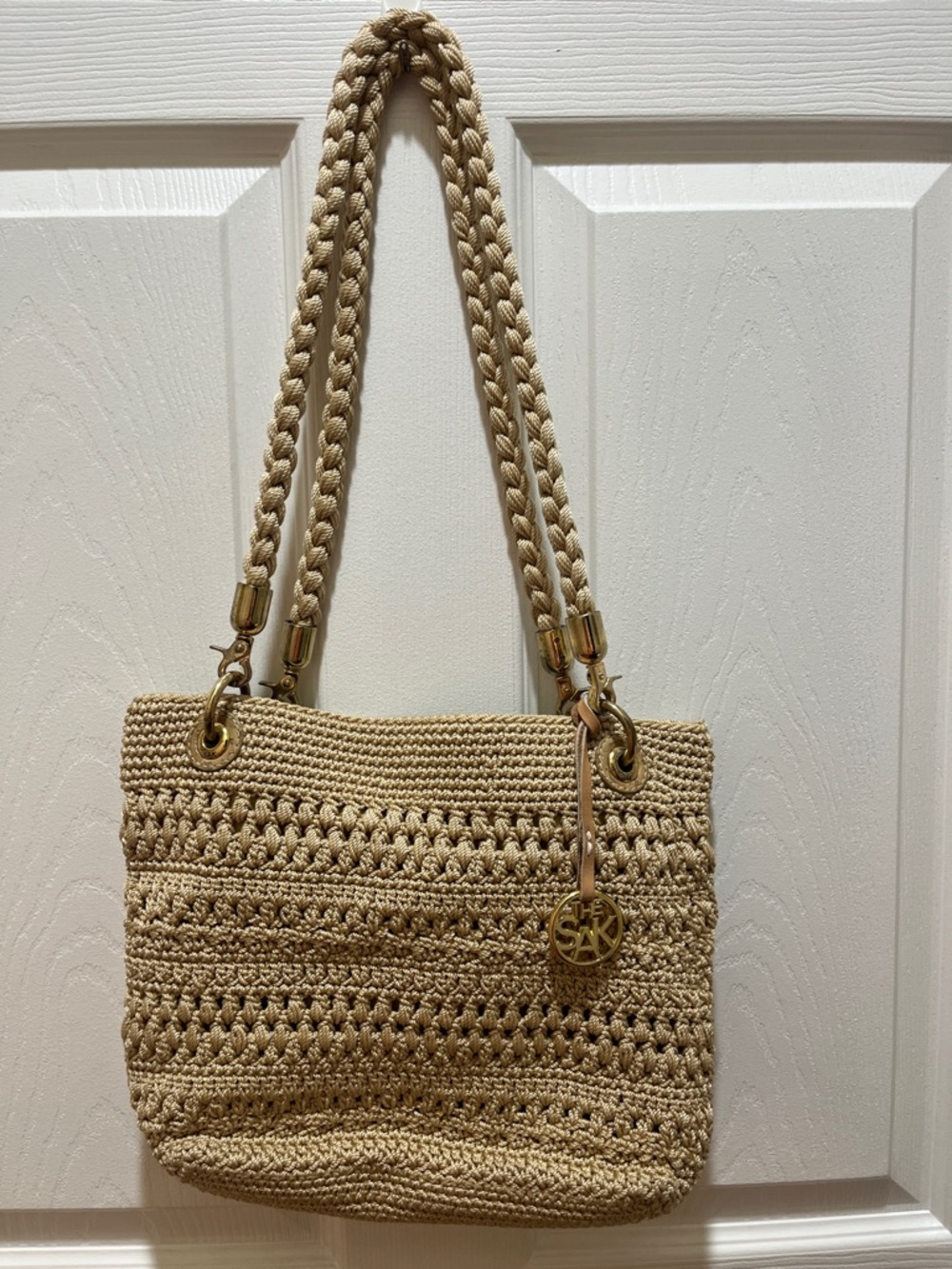 The Sak Beige Crochet Shoulder Bag with Gold Hardware